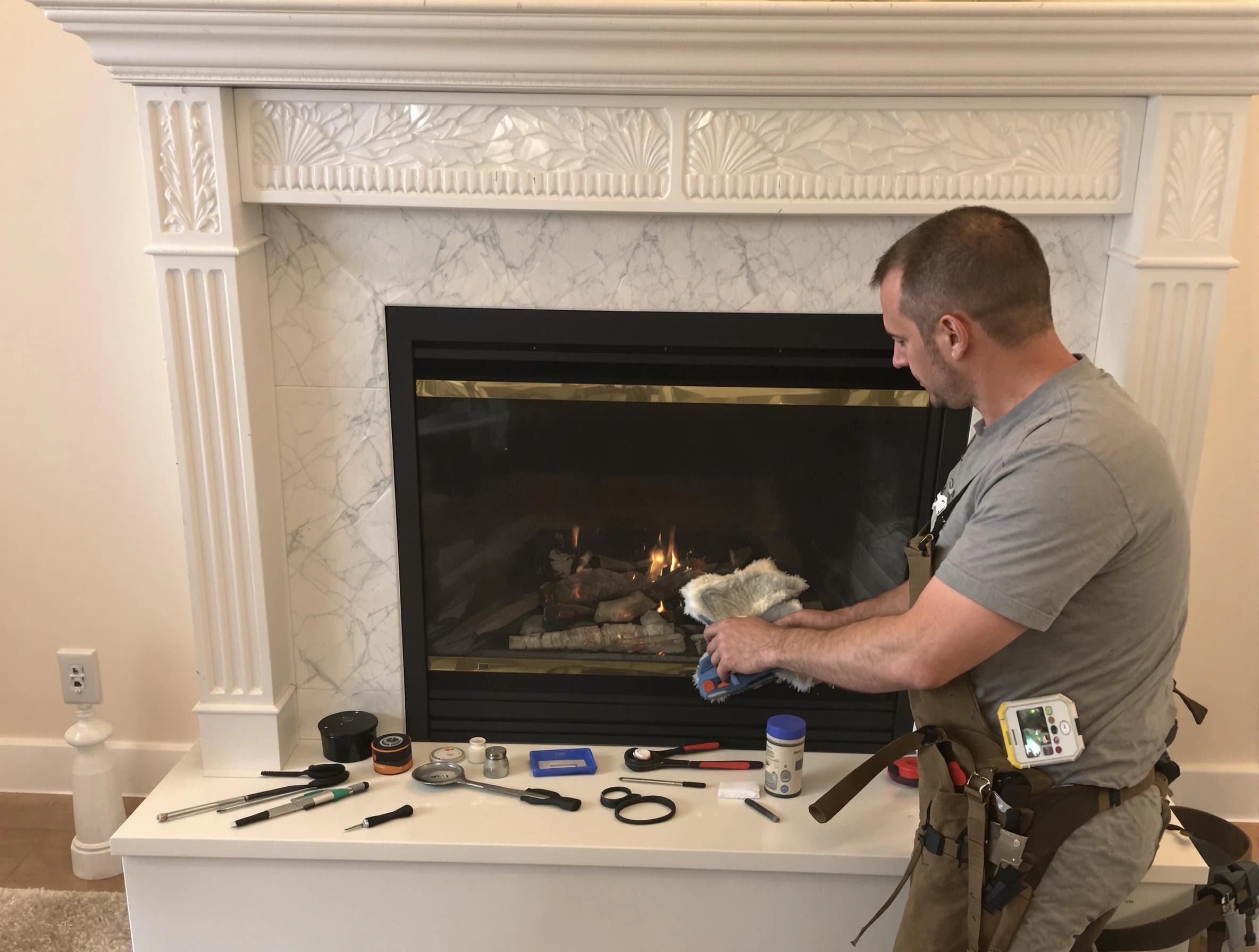 West Deer Chimney Sweep performing fireplace maintenance in West Deer, PA